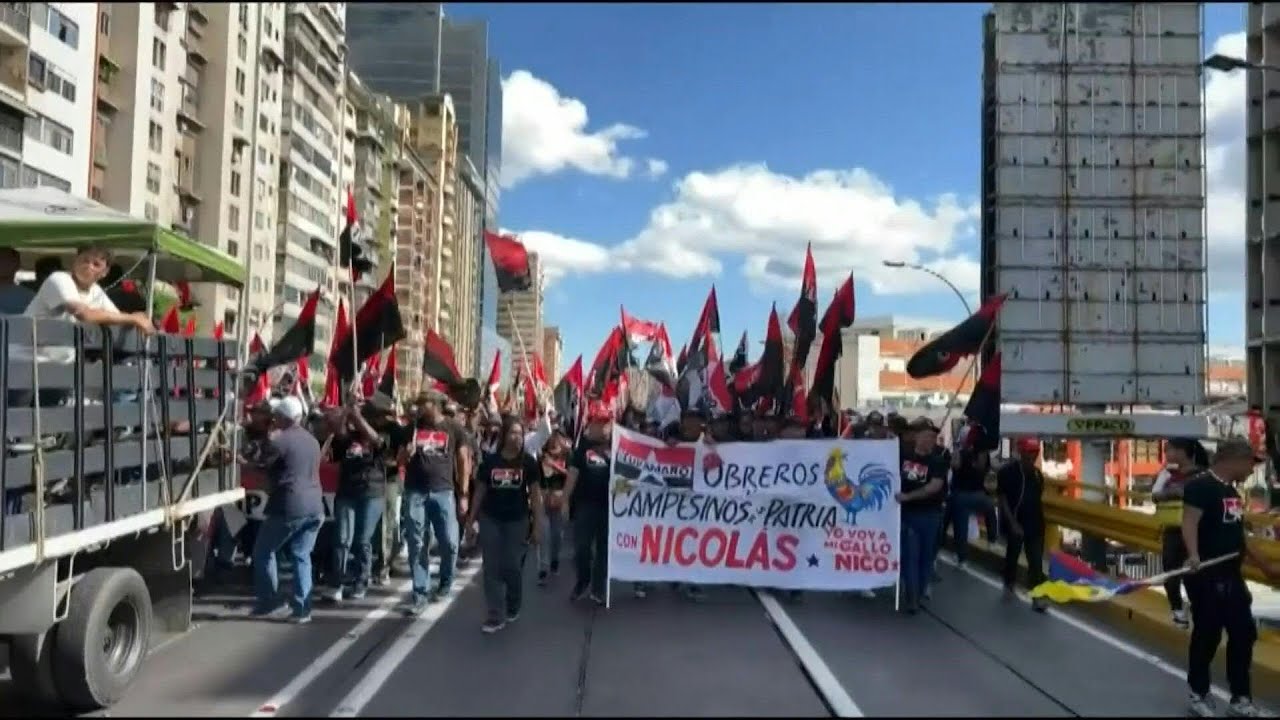 Pro-Maduro supporters stage counter protest against opposition | AFP