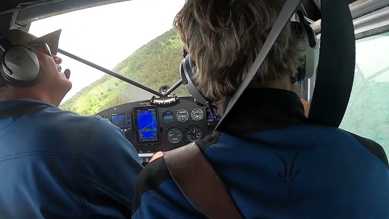 1955 Cessna 180 beach landing