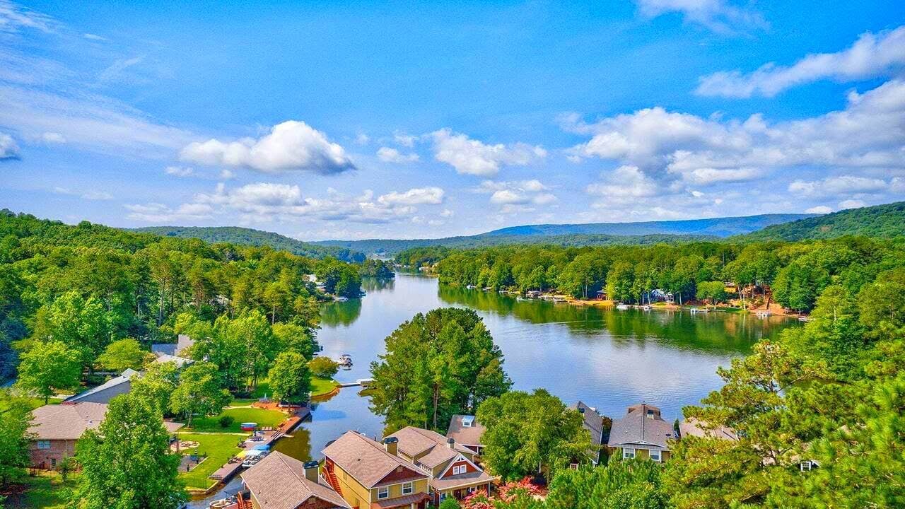 5 AMAZING Features of 2 Model Homes with LAKE VIEWS in a Gated, Golf Community