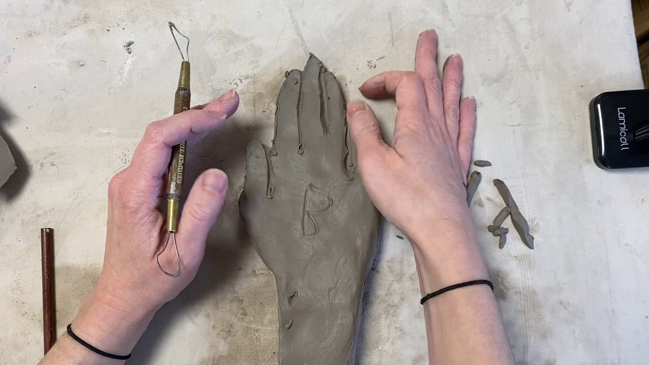 Hollowing technique/ making hands out of clay step 1