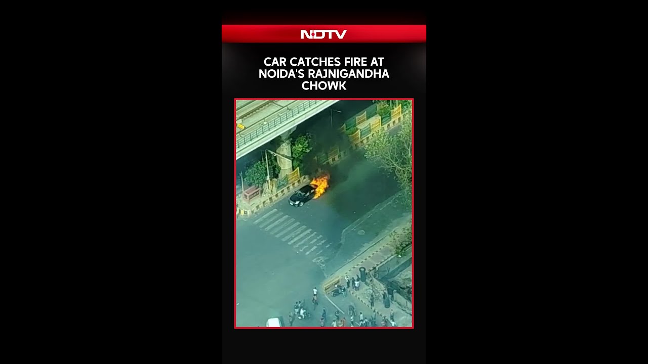 Car Catches Fire at Noida's Rajnigandha Chowk, Dramatic Visuals Emerge