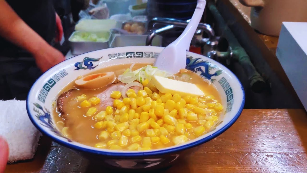 BUTTER RAMEN! Eating at the FAMOUS Ramen NOODLE ALLEY in Sapporo Japan! Foods to Eat Before You Die!