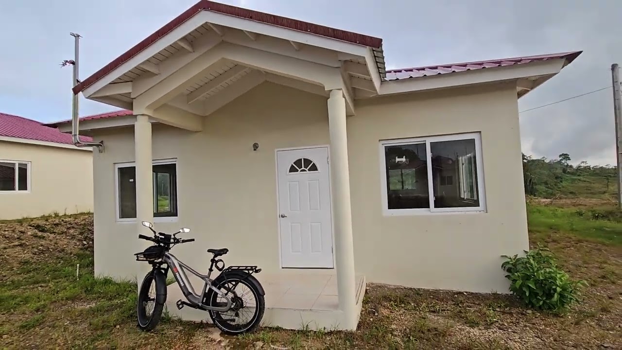 Taking Shelter in one of the New NHT Houses  in the  Mandeville Development
