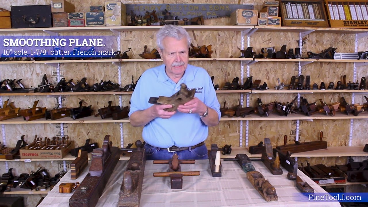Decoratively carved woodworking tools.