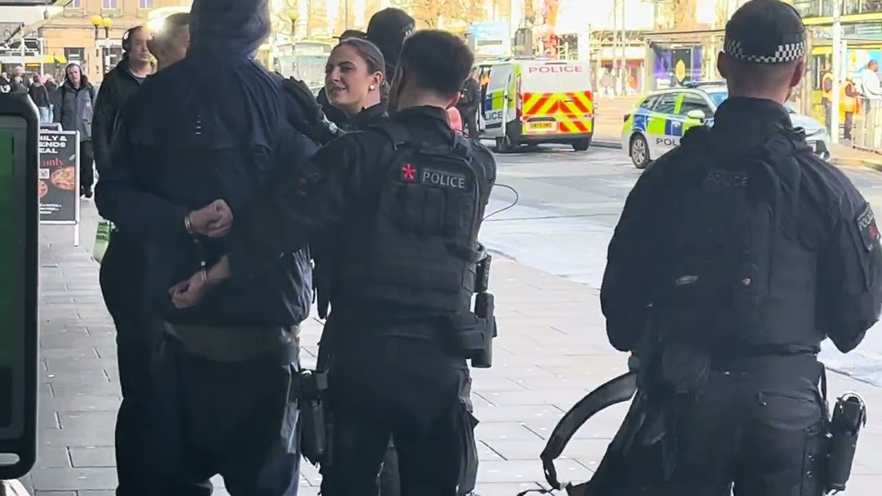 Early morning fighting armed police responding to man kicking off