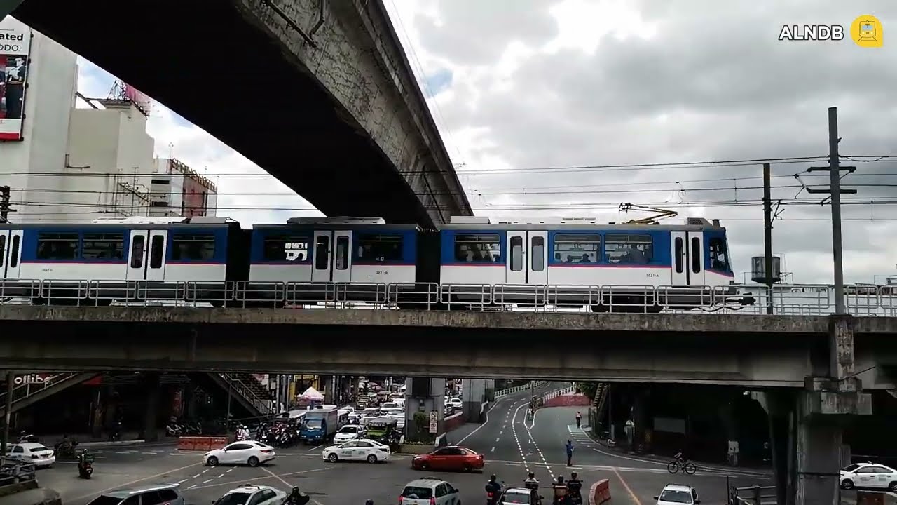 MRT-3 and LRT-2 Trains in EDSA, Aurora Boulevard Intersection
