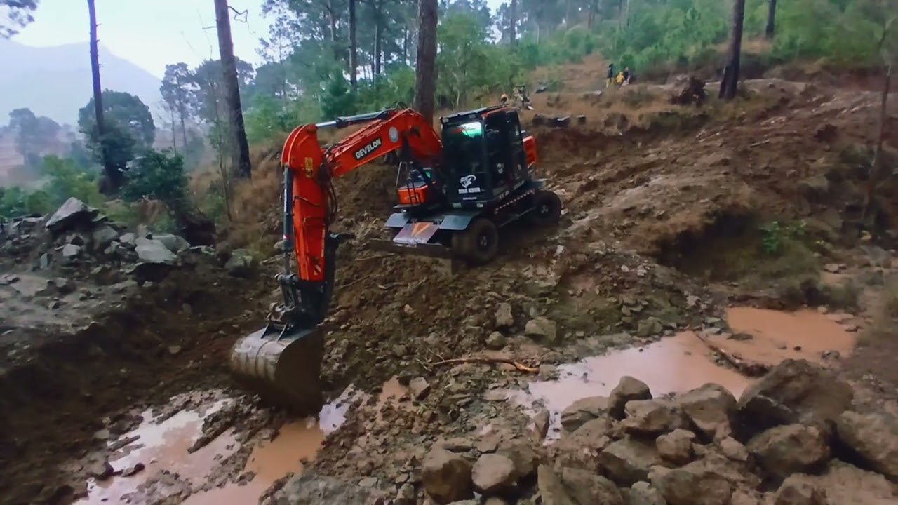Excavator is digging / After rain excavator condition and working progress after rain 