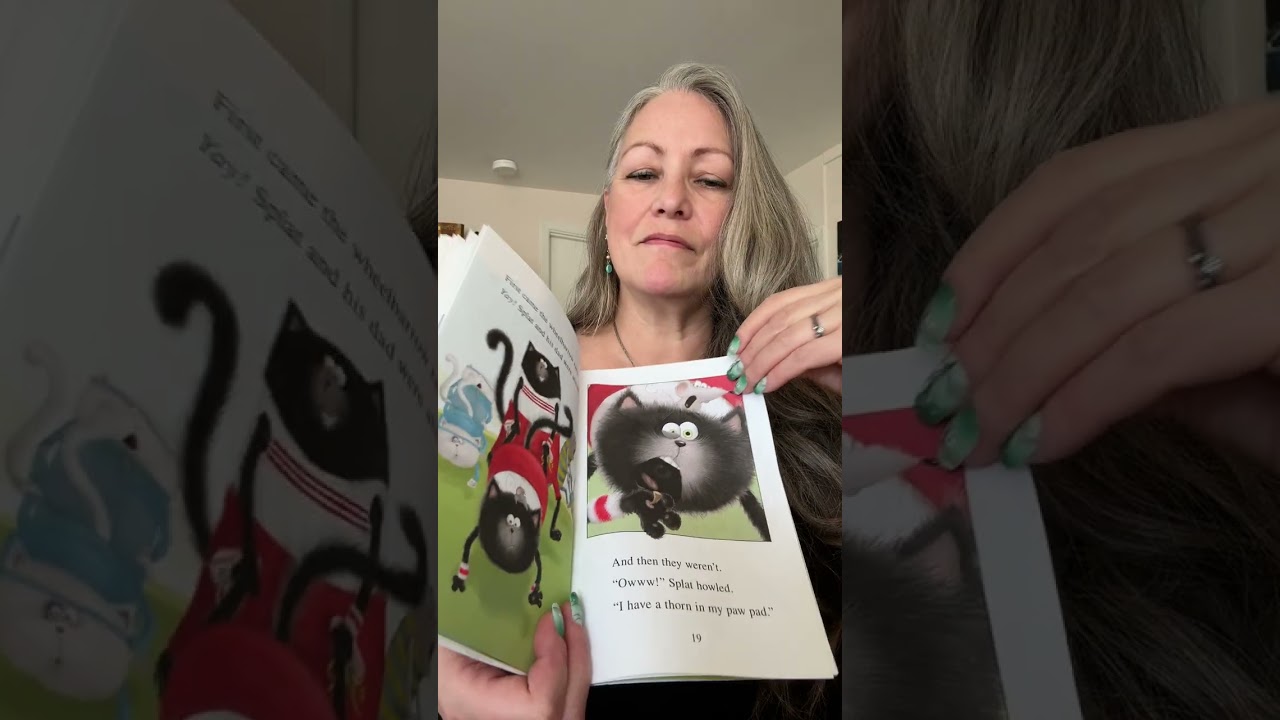 Mormy reads “Splat the Cat makes Dad glad” by Rob Scotton 