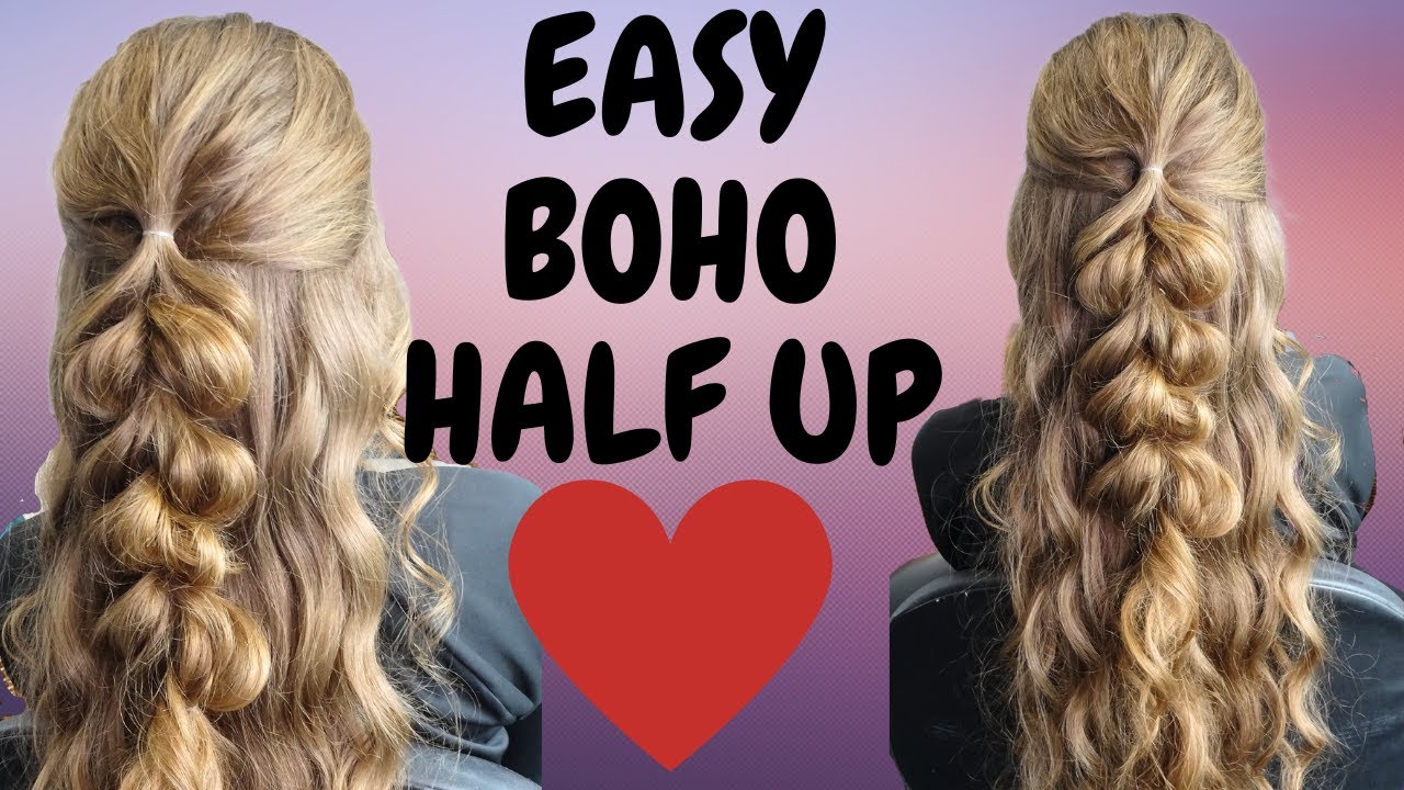 Messy braided wavy half up half down hairstyle