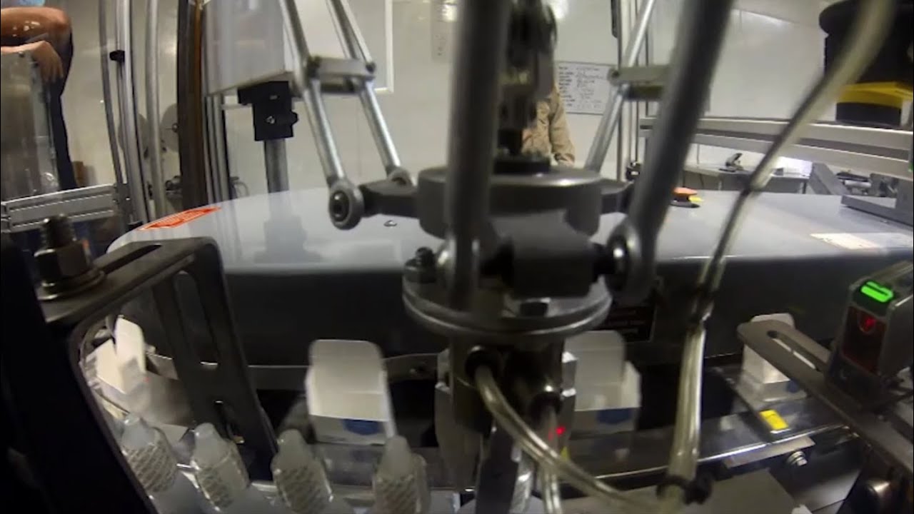 Pharmaceutical Cartoning System with Robotic Pick & Place - Trans Automation Technologies