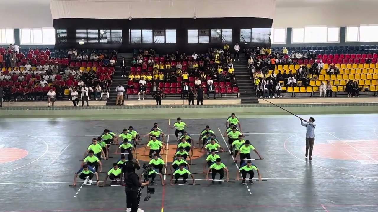 عرض رياضي بإستخدام العصا لطلاب الفرقة التانيه بنين كليه علوم الرياضة جامعة بورسعيد