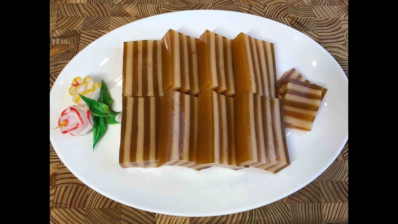 [焦糖練奶九層糕]-爽口軟硬適中有韌性，光澤亮麗軟滑有彈性，接疊不會斷，Q爽韌，層次分明，色彩對比度異常明顯，焦糖顏色天然風味獨特，香味濃郁，煉奶潔白甜潤可口，一款色香味型俱全美味甜點。
