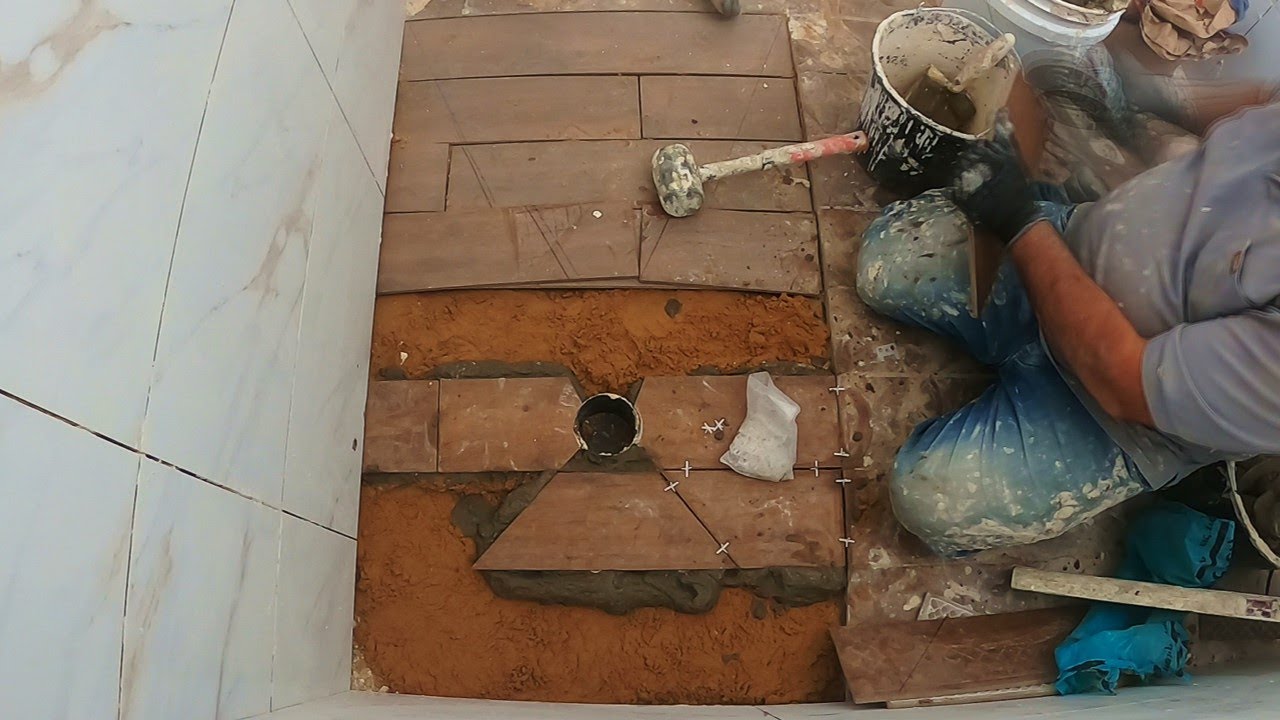 שיפוץ חדר אמבטיה ריצוף קרמיקה דמוי פרקט - יצא מדהים