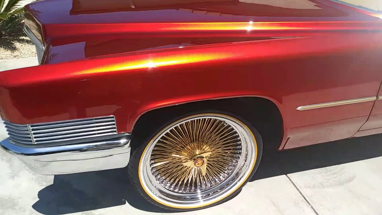 1970 Cadillac DeVille wet wet candy paint 24k gold rims