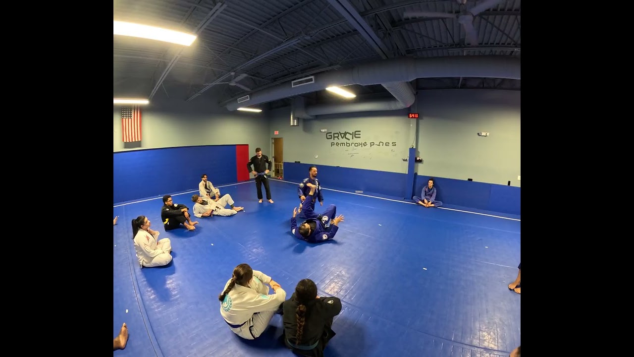 Lasso guard sweep when opponent stands 