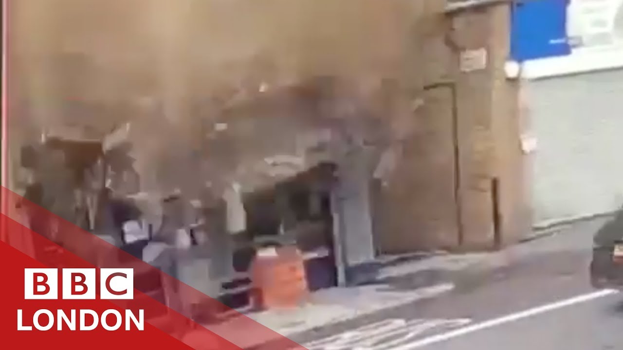 Man's lucky escape as building collapses - BBC London