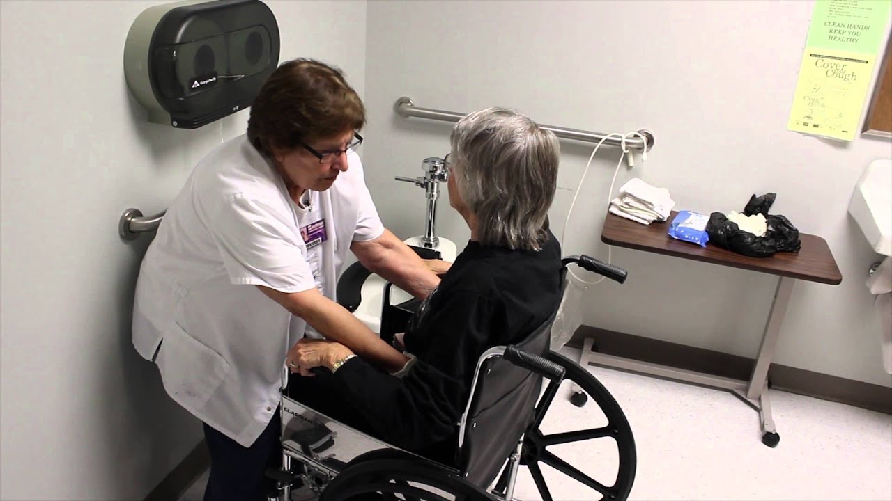 Transferring a resident from wheelchair to toilet