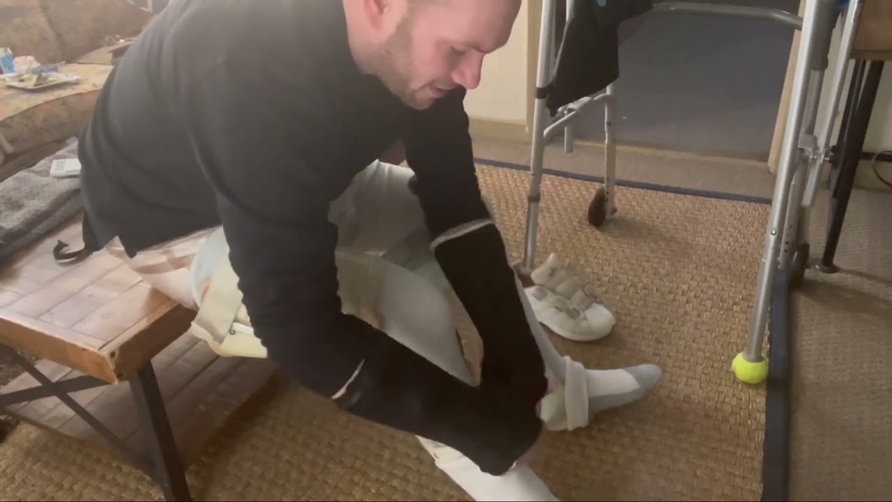 Putting on kafo leg braces