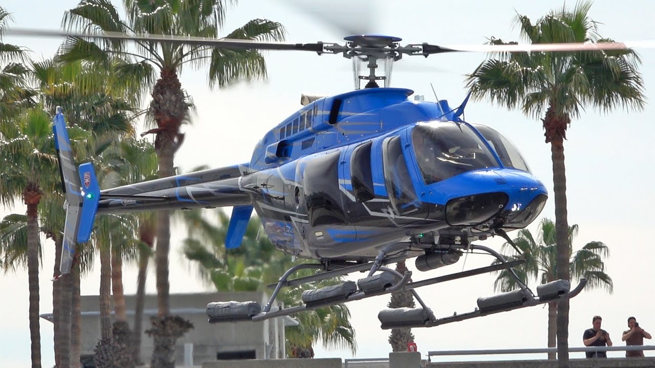 Stunning Bell 407 helicopter landing at HAI heli expo