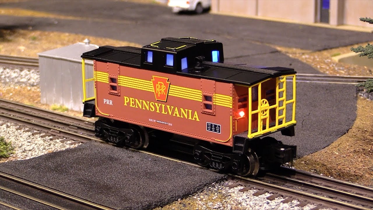 Освещенный вагон-кабуз Menards O-Gauge