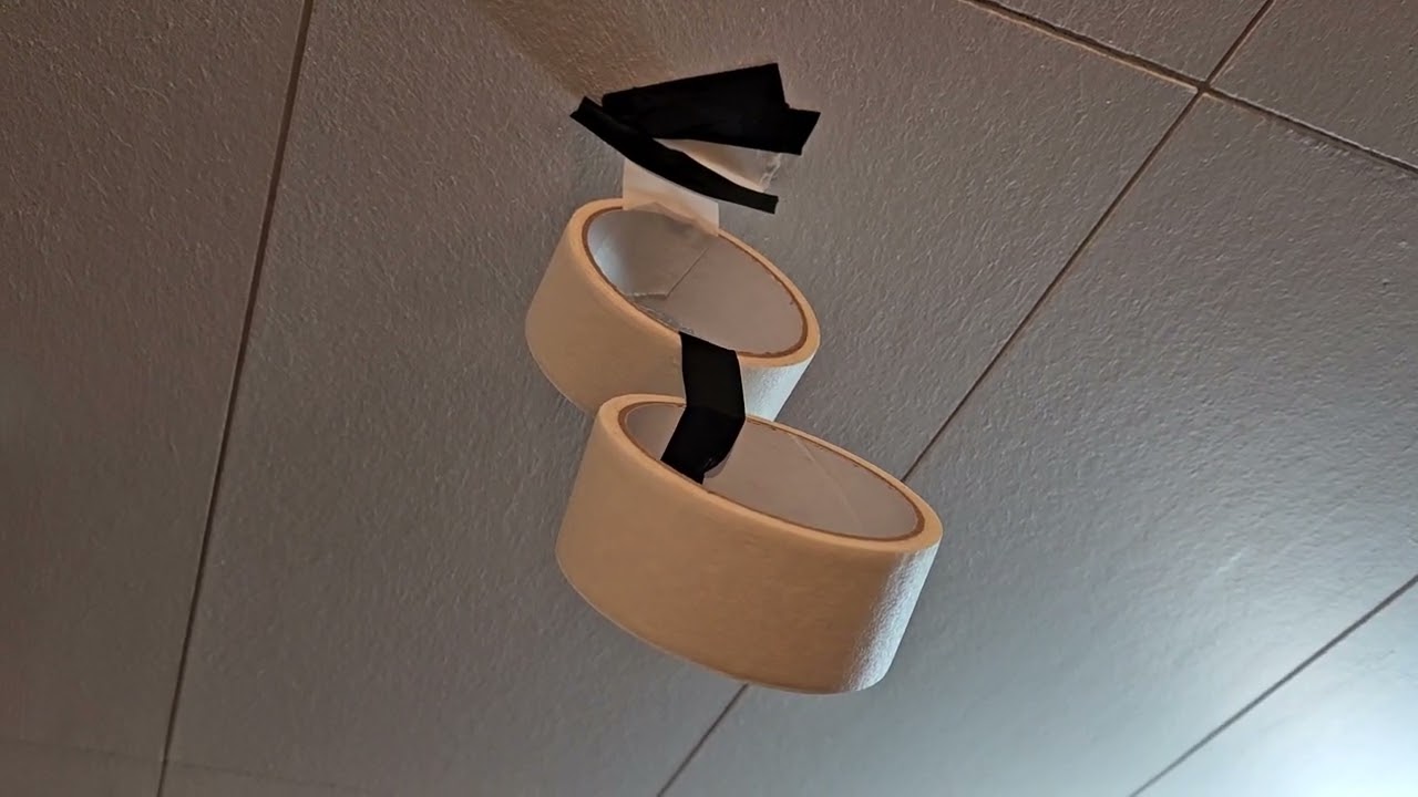 Tape taped to a tape taped to the ceiling