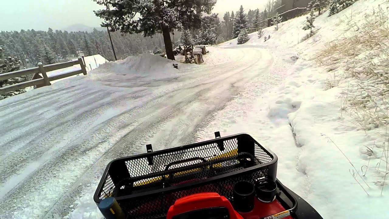 Snow Plowing Driveway with a 2005 Arctic Cat 500