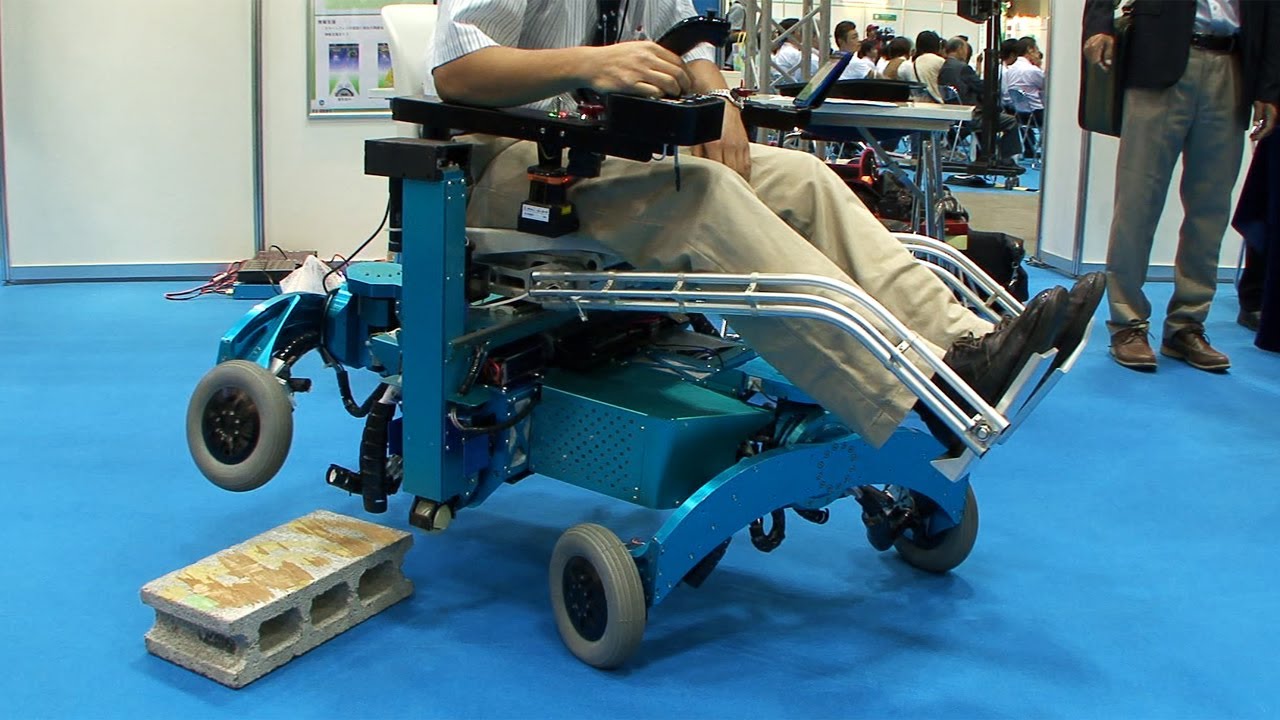 Robotic wheelchair from Chiba Tech turns wheels into legs and climbs over steps 