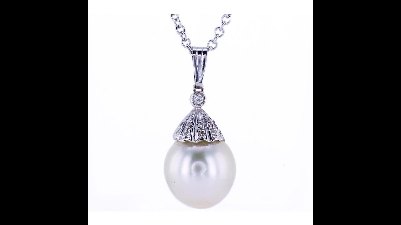 0.15CT Diamond And Pearl Pendant in 14KT White Gold