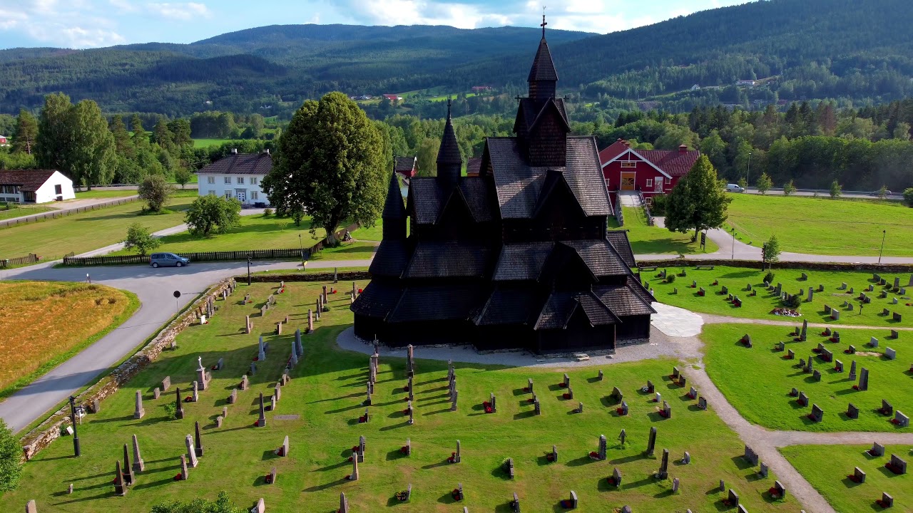 Heddal stavkirke, real viking church from the 13th century! Heddal, Norway - 4K - DRONE