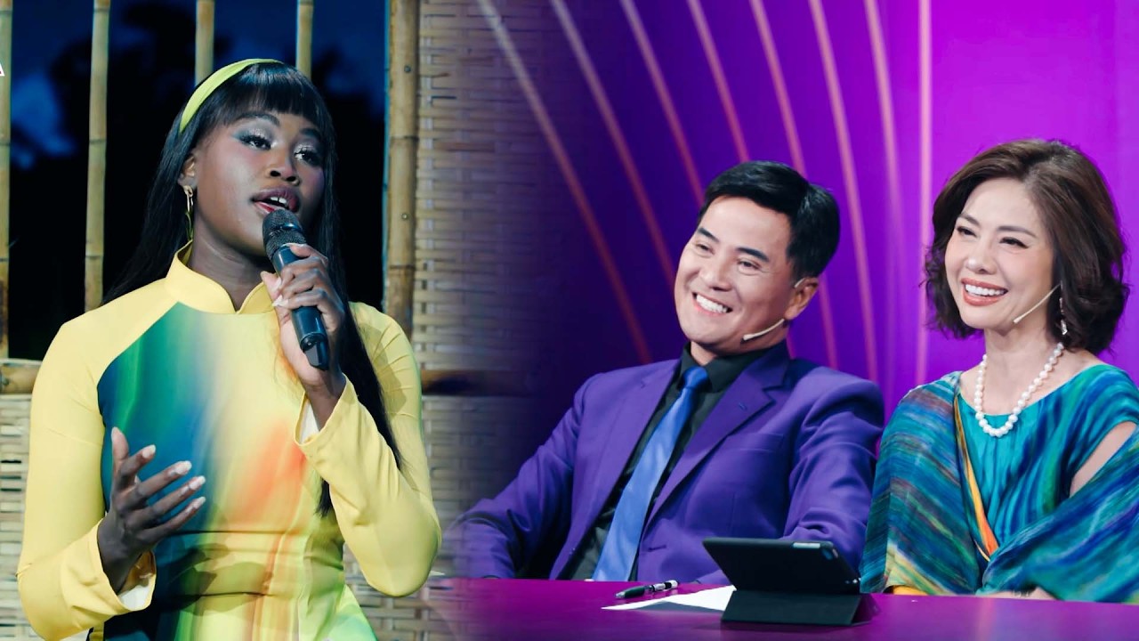 Cô gái Nam Phi mặc áo dài hát BOLERO 