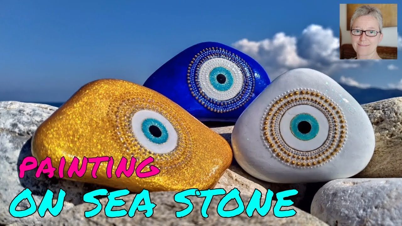 Hand painting sea stones 