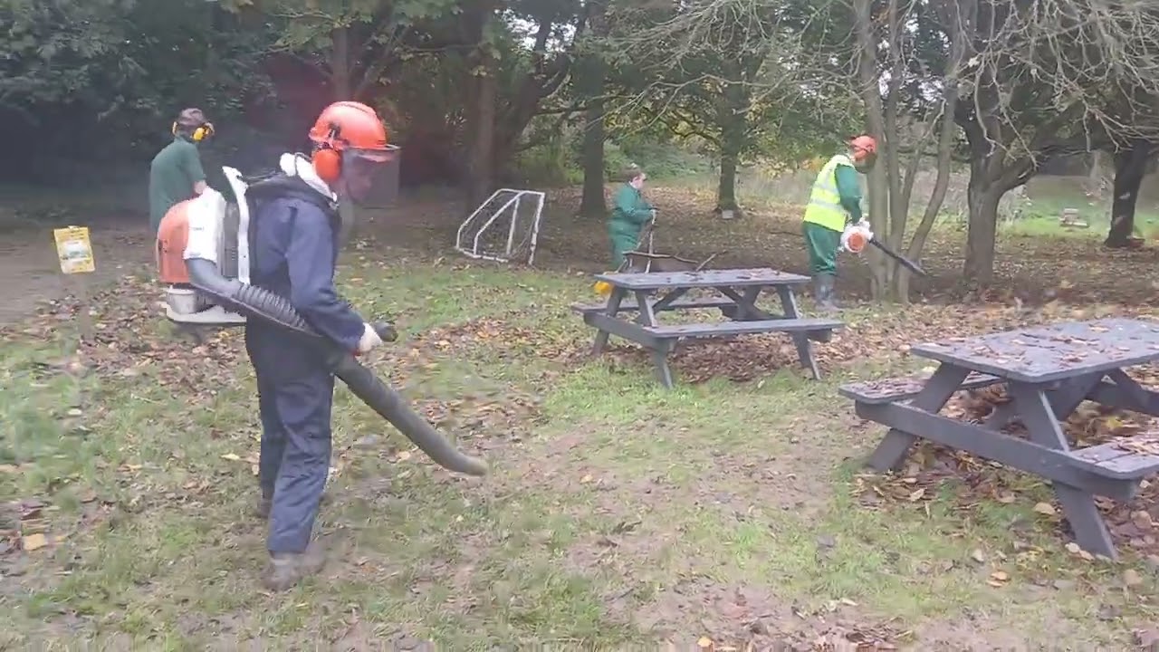 Me leaf blowing at college