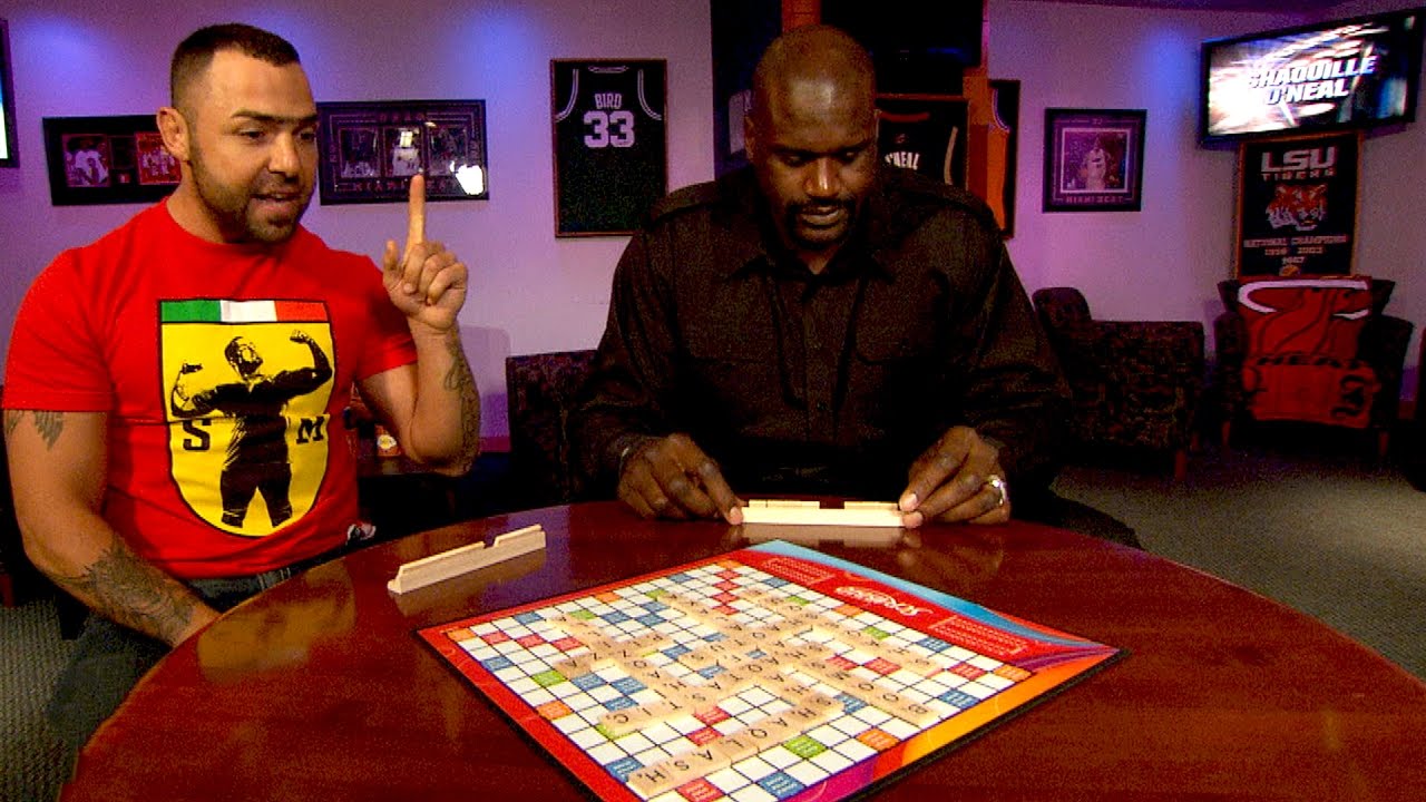 Shaquille O'Neal and Santino Marella play a game of Scrabble