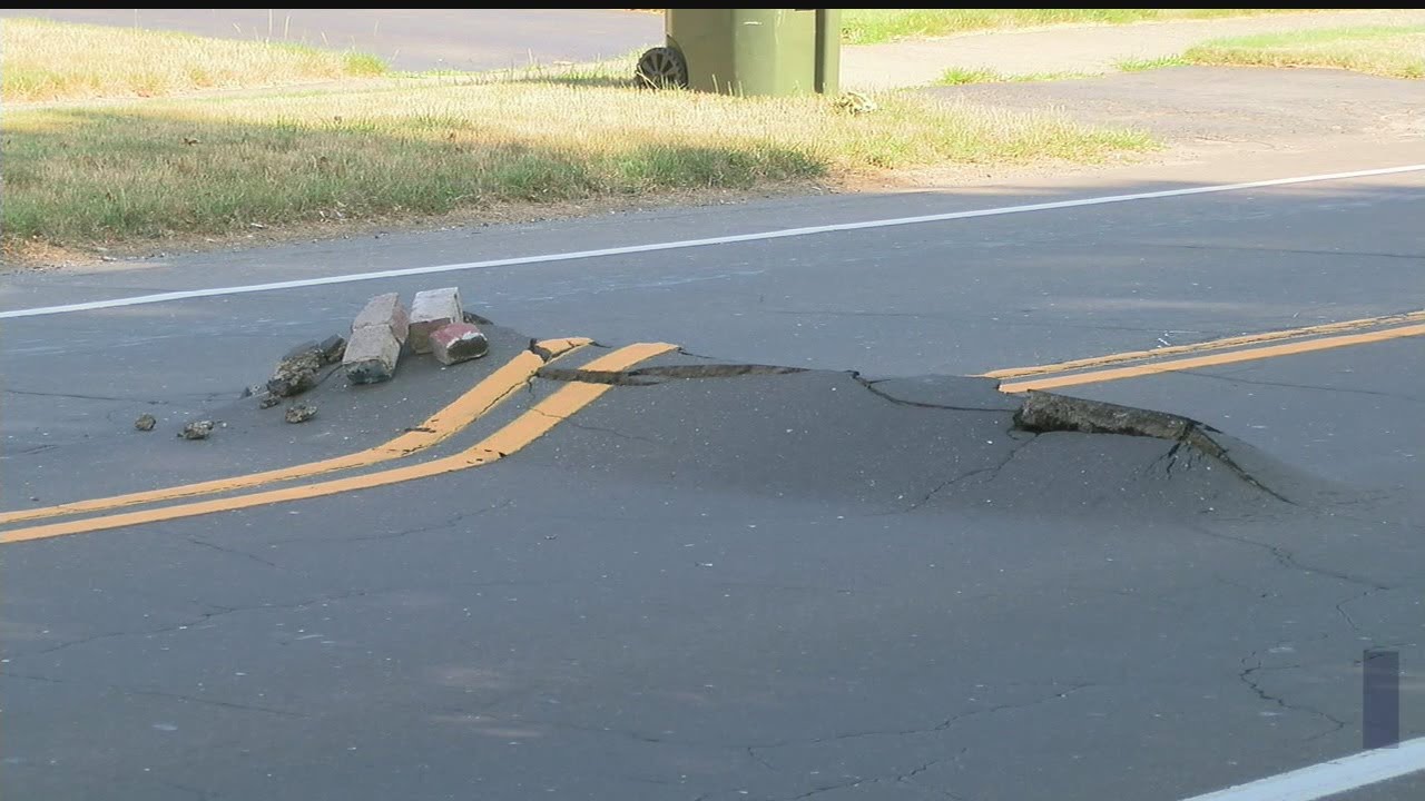 Road buckles at intersection in Poland