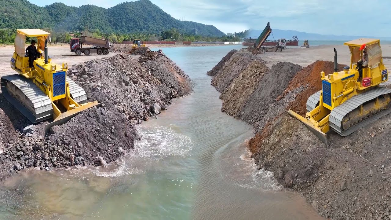 Wow Incridible !!The Best Tearm Work DumpTruck 25TON Unloding Stone And Dozer Push In Water Sea