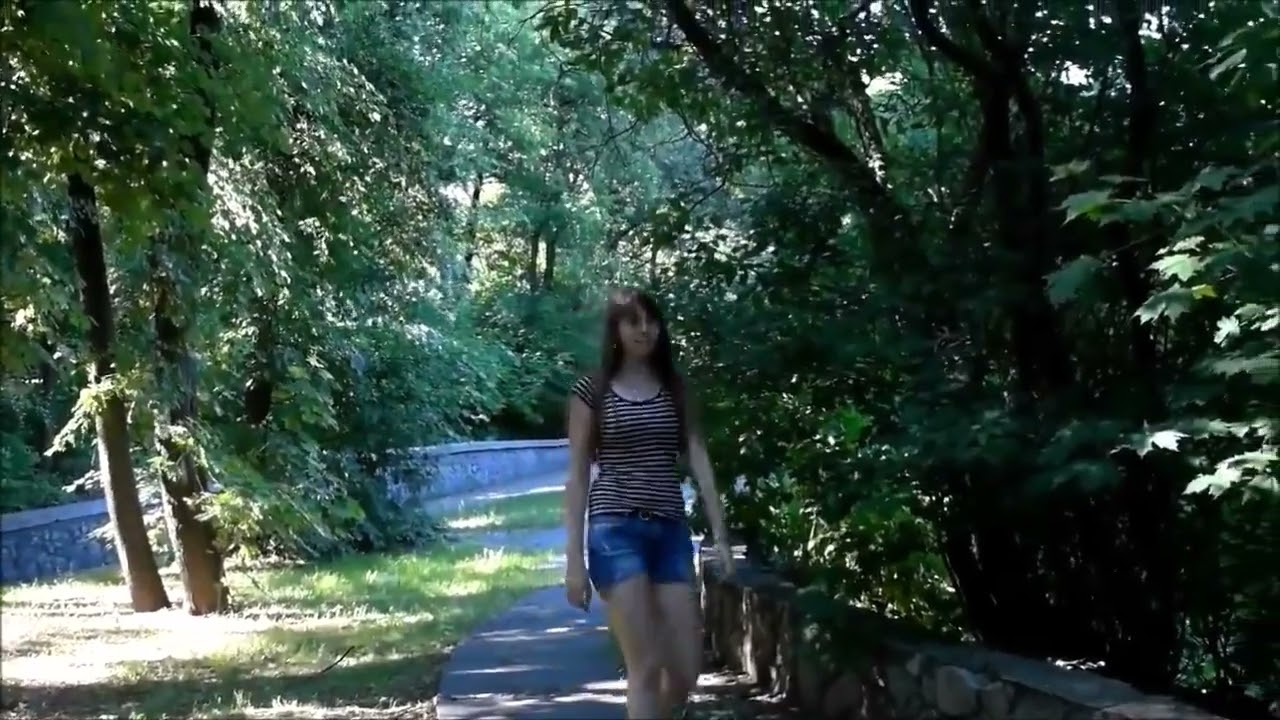 Woman walks near a group of snails in sneakers