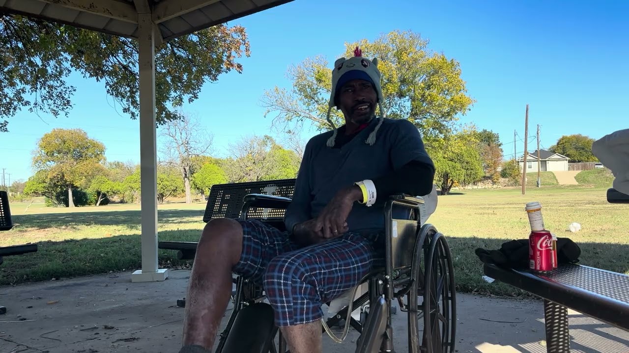 Street life Fort Worth Homeless crisis Man living under a canopy in the park | USA homeless crisis