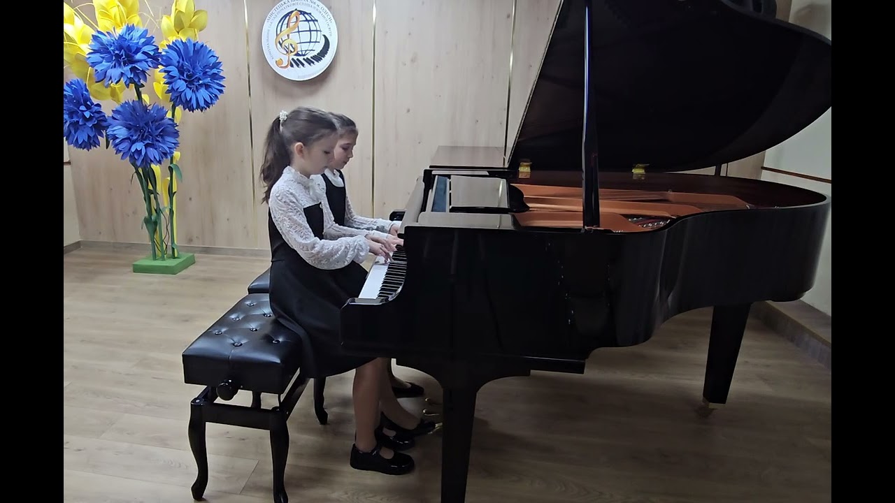 Балєсна Іларія-3кл. Винарчук Даніела-5кл.  Г. Лукіних. Перекладання Н.Сороки. Сніжний вальс.