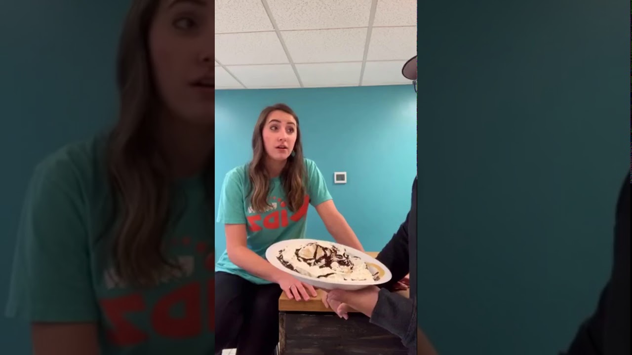Youth leader pied in the face.