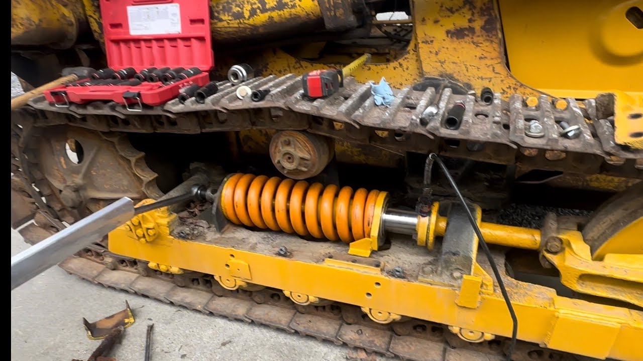 CAT Track Loader Recoil Spring Adjuster Install