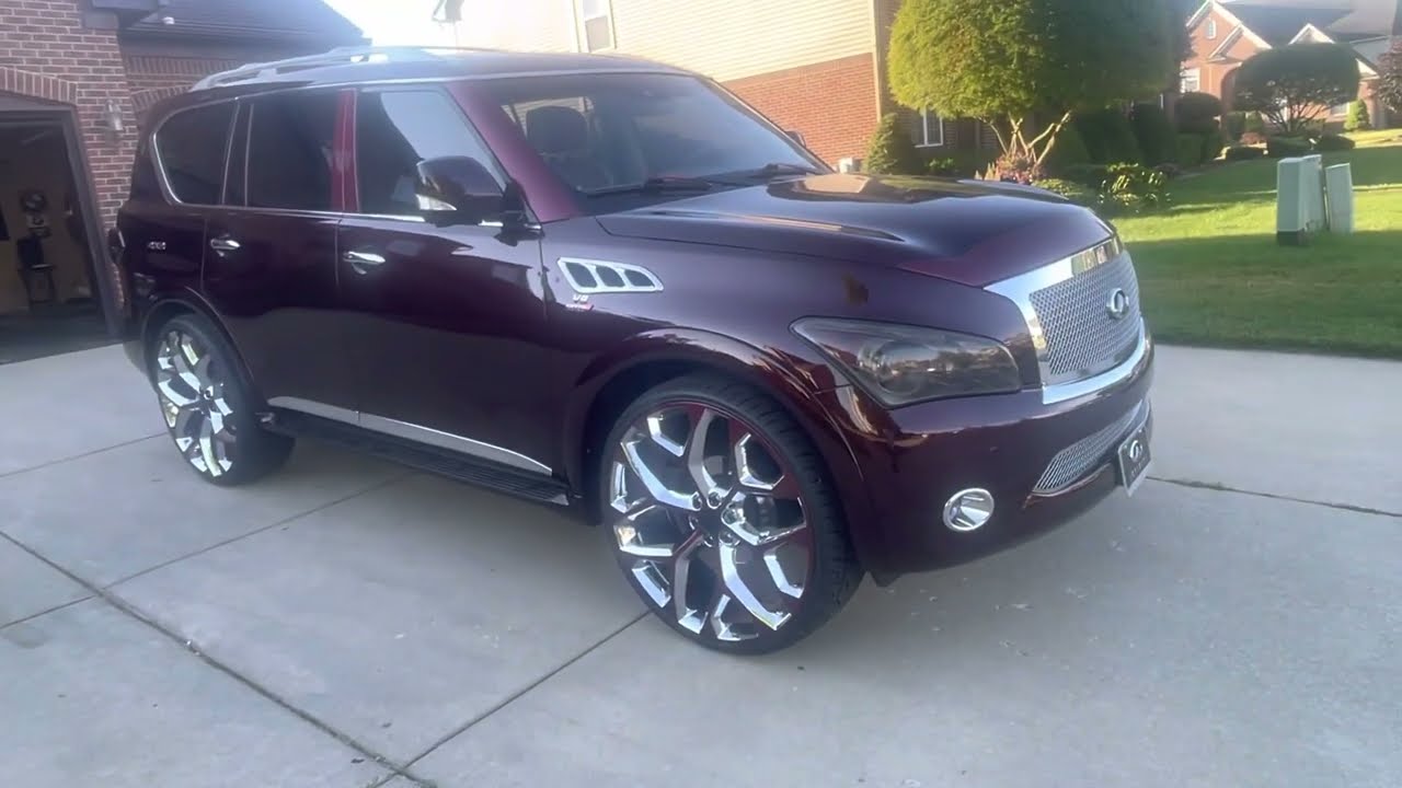 J.Poww's CUSTOM Painted Infiniti QX56 Wine Candy Paint sittin on 28 Inch wheels