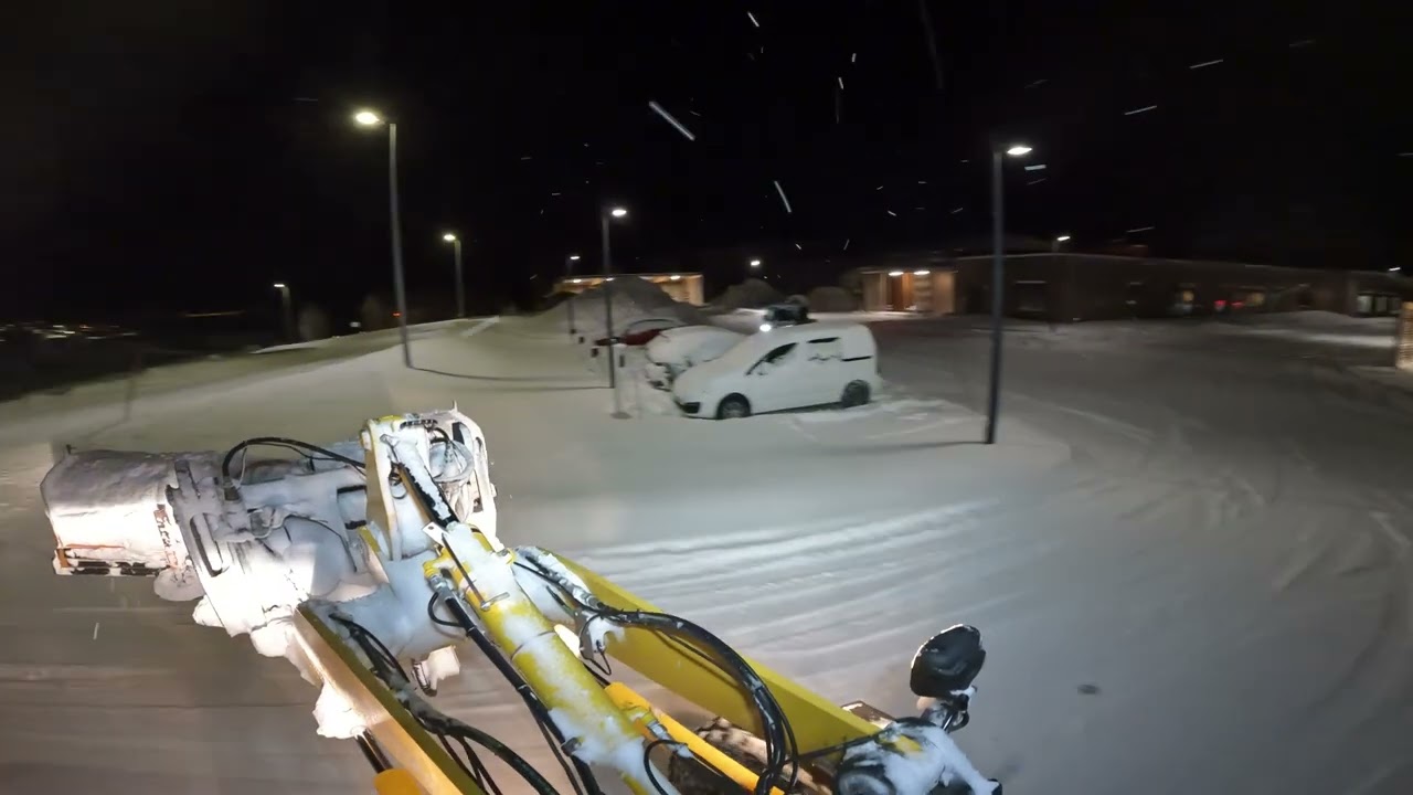 snow plowing the sidewalksin northern norway in a snowstorm!