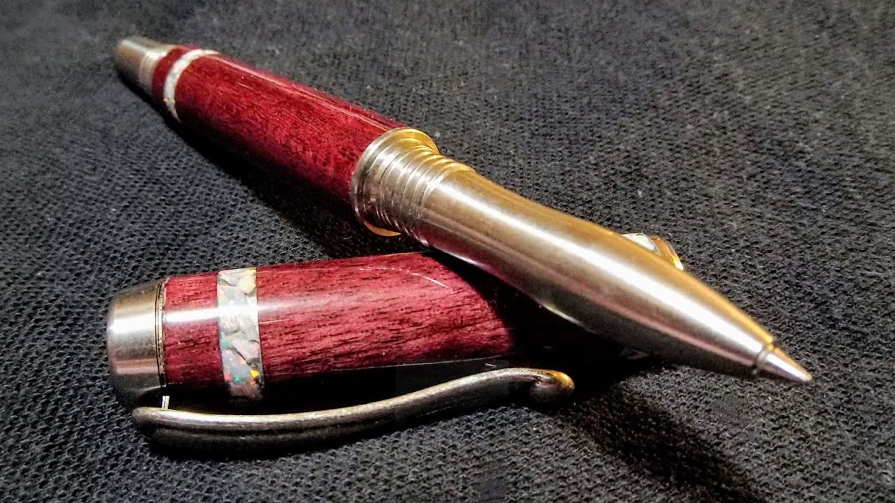 New Band-It Rollerball Pen in Purple Heart with Opal Inlay
