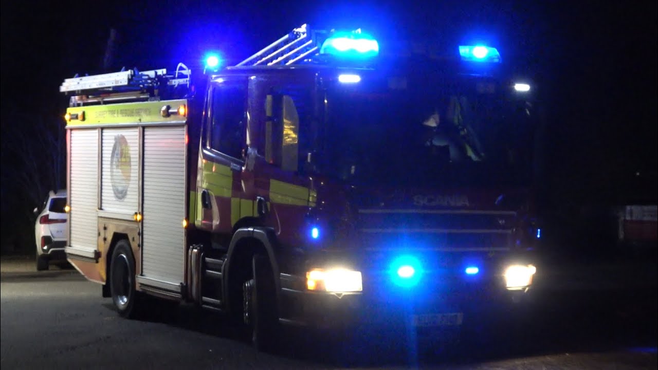 Surrey Fire & Rescue Service, S24P1 (Godalming) on-call pump, turning out to an emergency incident.