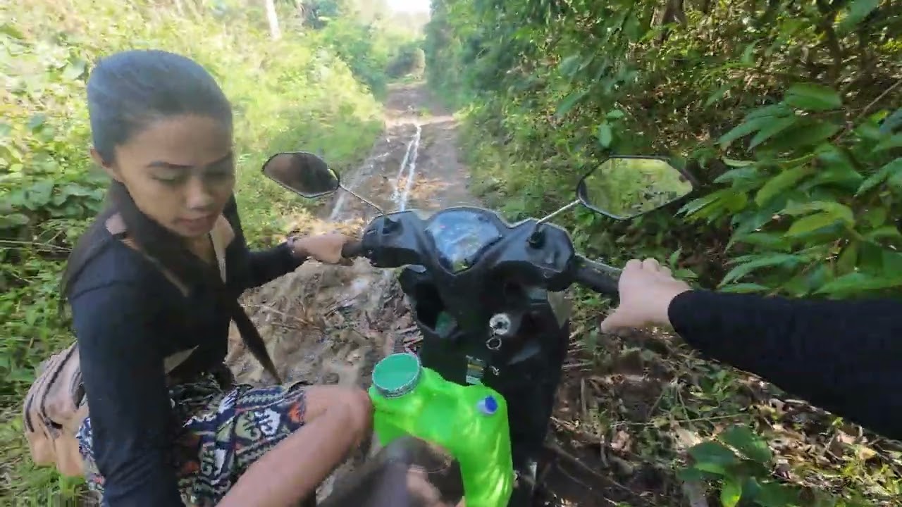 Riding 2 motorbikes to town