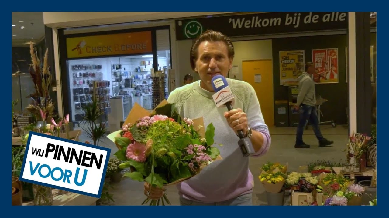 EEN BLOEMETJE CADEAU VAN MISTER PIN IN WINKELCENTRUM KERNKWARTIER