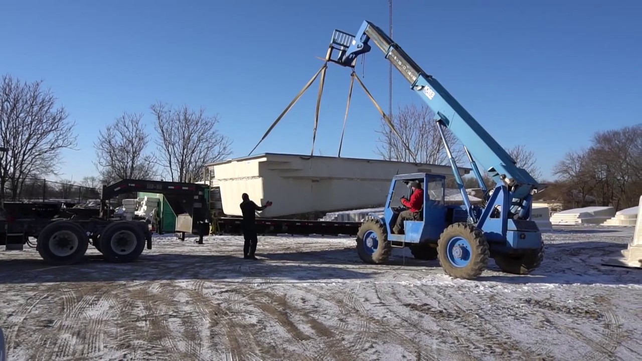 Loading a Barrier Reef Fiberglass Pool for Transport in the Winter