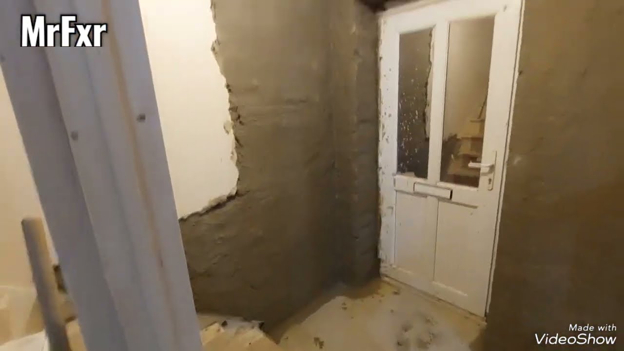 Wall tanking with cement based slurry
