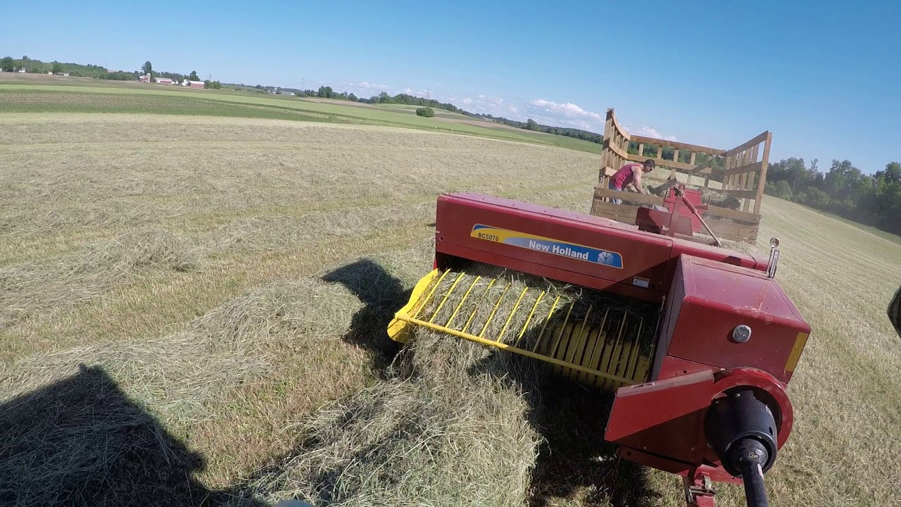 Baling heavy double windrow of hay 6/11/18