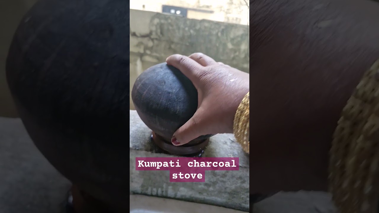 Clay pot cooking on charcoal stove